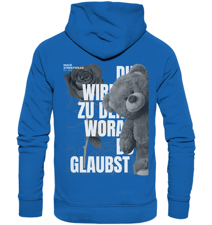 "Du wirdst zu den woran du glaubst" Mace Optimismus - Premium Unisex Hoodie