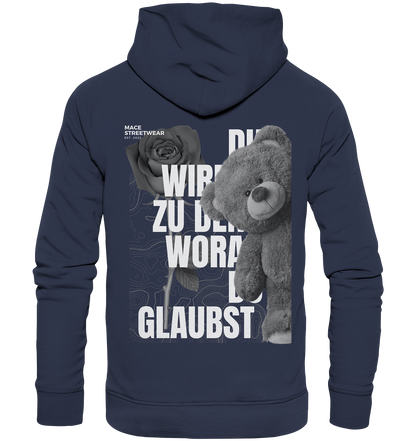 "Du wirdst zu den woran du glaubst" Mace Optimismus - Premium Unisex Hoodie