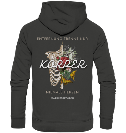 "Körper" Mace Optimismus - Premium Unisex Hoodie